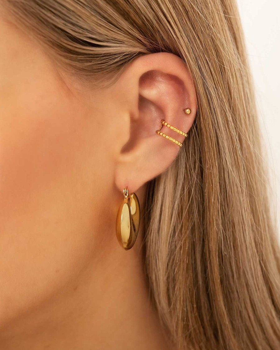 Oorbellen Finaste | Double Dots Ear Cuff Goudkleurig